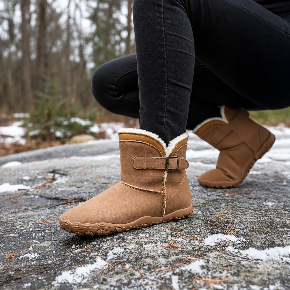 
Bottines doublées avec boucle latérale